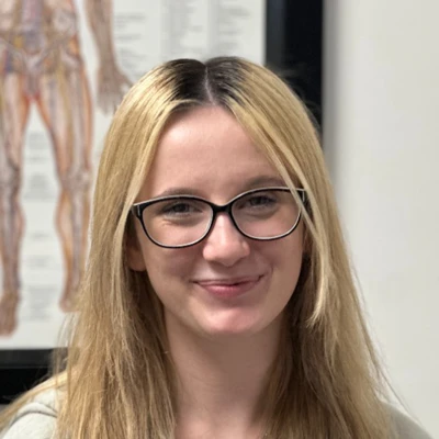 A headshot photo of Taylor, a member of the Support Staff